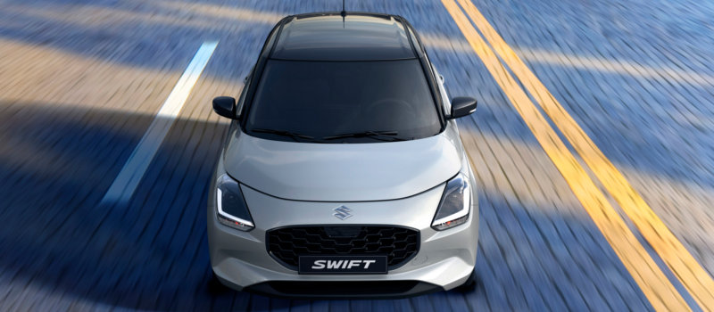 Mengelers Suzuki Limburg - Suzuki Swift 2024 Pure White Pearl en Mineral Grey Metallic